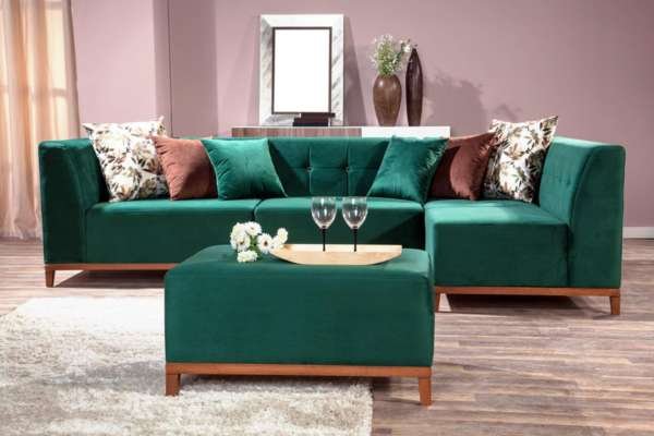 Importance of the Emerald Green Sofa in the Living Room

